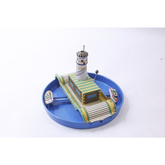 Wind-up Boat Carousel with a Lighthouse, 5 inches Round Tin Toy, Vintage, - Picture 1 of 3